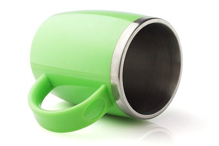 simsearch:630-02220781,k - Green Stainless Steel Mug Lying on White Background Foto de stock - Super Valor sin royalties y Suscripción, Código: 400-08156752