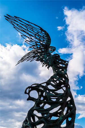 freedom monument - Nike statue at Giardini Naxos, Sicily, Italy -  Nike Carmelo Mendola sculpture Fotografie stock - Microstock e Abbonamento, Codice: 400-08156900