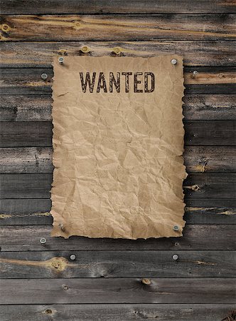 Wild West wanted poster on weathered plank wood wall Stock Photo - Budget Royalty-Free & Subscription, Code: 400-08158784
