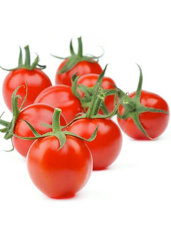 simsearch:400-06857433,k - Perfect Ripe Cherry Tomatoes with Stems isolated on white background. Focus on Foreground Foto de stock - Super Valor sin royalties y Suscripción, Código: 400-08159808