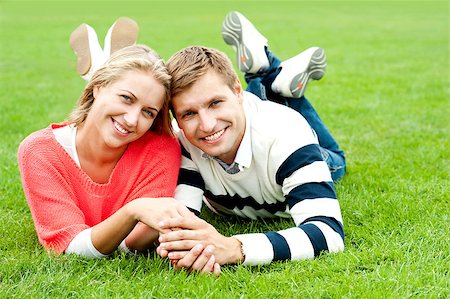 Happy attractive smiling young couple spending great day outside Stock Photo - Budget Royalty-Free & Subscription, Code: 400-08151400