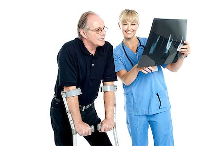 simsearch:400-07987656,k - Surgeon showing x-ray sheet to her patient. Damages caused by accident. Stock Photo - Budget Royalty-Free & Subscription, Code: 400-08151498