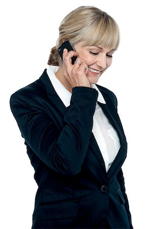 simsearch:400-07106831,k - Corporate lady engaged in a business call with client, isolated against white. Stockbilder - Microstock & Abonnement, Bildnummer: 400-08151553