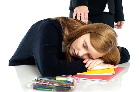 sleeping in a classroom - Teacher waking up a dozed off student. Indoor studio shot. Stock Photo - Budget Royalty-Free & Subscription, Code: 400-08151631