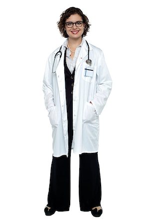 simsearch:400-08131186,k - Full length portrait of a lovely female doctor posing against white background. Foto de stock - Royalty-Free Super Valor e Assinatura, Número: 400-08151969
