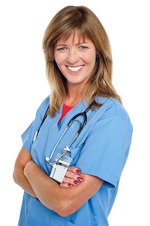 simsearch:400-08131186,k - Side profile of a cheerful middle aged physician posing with folded arms. Stock Photo - Budget Royalty-Free & Subscription, Code: 400-08152100