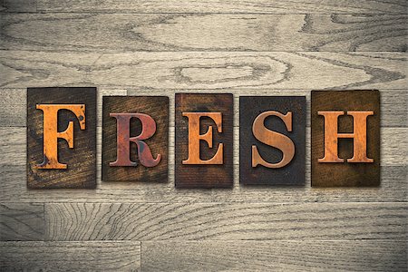 simsearch:400-08152413,k - The word "FRESH" theme written in vintage, ink stained, wooden letterpress type on a wood grained background. Foto de stock - Super Valor sin royalties y Suscripción, Código: 400-08152401