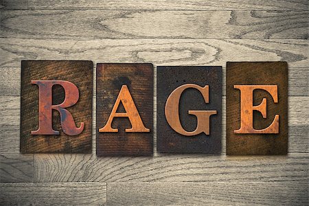 The word "RAGE" theme written in vintage, ink stained, wooden letterpress type on a wood grained background. Stock Photo - Budget Royalty-Free & Subscription, Code: 400-08152420