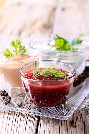 Selection of three dipping sauces on a tray Stock Photo - Budget Royalty-Free & Subscription, Code: 400-08152617