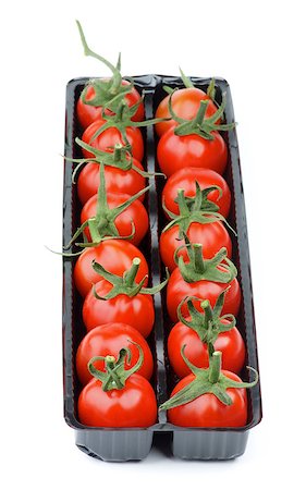 simsearch:400-06857433,k - Perfect Ripe Cherry Tomatoes with Stems in Black Plastic Container isolated on white background. Focus on Foreground Foto de stock - Super Valor sin royalties y Suscripción, Código: 400-08152808