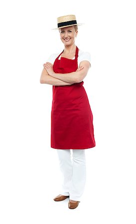 Beautiful confident chef posing in style, arms folded. Full length shot Photographie de stock - Aubaine LD & Abonnement, Code: 400-08153091