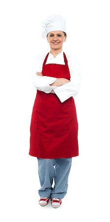 Beautiful aged female chef posing in uniform with arms crossed, full length portrait Photographie de stock - Aubaine LD & Abonnement, Code: 400-08153106