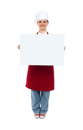 Smiling chef displaying white advertising board, full length portrait Stock Photo - Budget Royalty-Free & Subscription, Code: 400-08153111