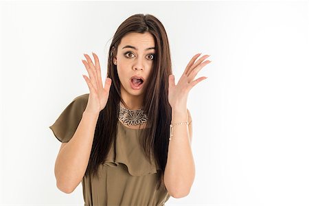 Scared young caucasian asian businesswoman with wide open eyes in nice fashion, isolated on white background Stock Photo - Budget Royalty-Free & Subscription, Code: 400-08153268