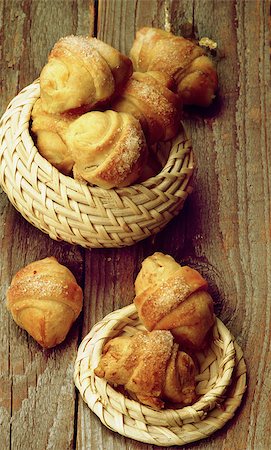 simsearch:400-07420117,k - Homemade Croissant Cookies with Jam in Wicker Bowls closeup on Wooden background. Retro Styled Stock Photo - Budget Royalty-Free & Subscription, Code: 400-08153456