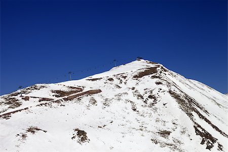 simsearch:400-04340231,k - Winter mountains and ski slope in little snow year. Caucasus Mountains, Georgia. Ski resort Gudauri. Stock Photo - Budget Royalty-Free & Subscription, Code: 400-08153524