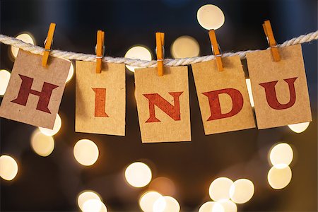 simsearch:400-08153760,k - The word HINDU printed on clothespin clipped cards in front of defocused glowing lights. Stockbilder - Microstock & Abonnement, Bildnummer: 400-08153940