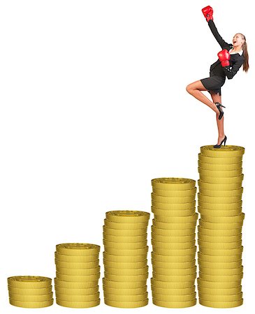 simsearch:400-08158930,k - Businesslady in boxing gloves and winning posture standing on gold coins stack. Isolated white background Stock Photo - Budget Royalty-Free & Subscription, Code: 400-08164179