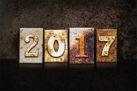 simsearch:400-08154669,k - The word "2017" written in rusty metal letterpress type on a dark textured grunge background. Stock Photo - Budget Royalty-Free & Subscription, Code: 400-08164724