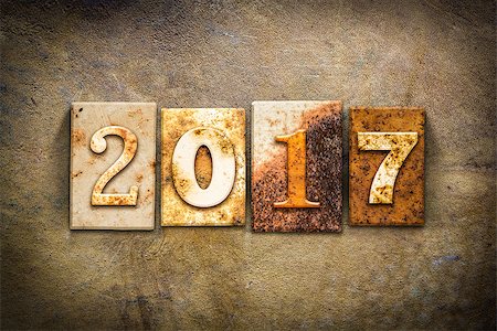 simsearch:400-08154669,k - The word "2017" written in rusty metal letterpress type on an old aged leather background. Stock Photo - Budget Royalty-Free & Subscription, Code: 400-08164725