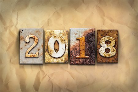 simsearch:400-08166004,k - The word "2018" written in rusty metal letterpress type on a crumbled aged paper background. Stock Photo - Budget Royalty-Free & Subscription, Code: 400-08164727