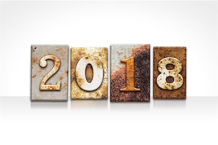 enterlinedesign (artist) - The word "2018" written in rusty metal letterpress type isolated on a white background. Foto de stock - Super Valor sin royalties y Suscripción, Código: 400-08164728