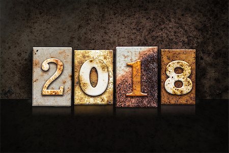 simsearch:400-08154669,k - The word "2018" written in rusty metal letterpress type on a dark textured grunge background. Stock Photo - Budget Royalty-Free & Subscription, Code: 400-08164729