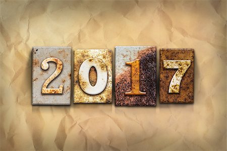 simsearch:400-08166004,k - The word "2017" written in rusty metal letterpress type on a crumbled aged paper background. Stock Photo - Budget Royalty-Free & Subscription, Code: 400-08164722