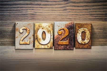 simsearch:400-08166276,k - The word "2020" written in rusty metal letterpress type sitting on a wooden ledge background. Stock Photo - Budget Royalty-Free & Subscription, Code: 400-08164741