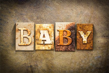 simsearch:400-08166276,k - The word "BABY" written in rusty metal letterpress type on an old aged leather background. Stock Photo - Budget Royalty-Free & Subscription, Code: 400-08164754