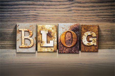simsearch:400-08166276,k - The word "BLOG" written in rusty metal letterpress type sitting on a wooden ledge background. Stock Photo - Budget Royalty-Free & Subscription, Code: 400-08164778