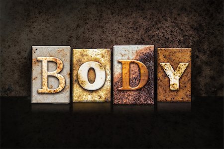 simsearch:400-08166276,k - The word "BODY" written in rusty metal letterpress type on a dark textured grunge background. Stock Photo - Budget Royalty-Free & Subscription, Code: 400-08164781