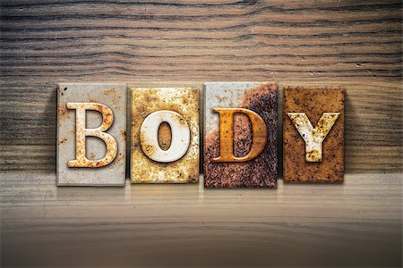 simsearch:400-08223086,k - The word "BODY" written in rusty metal letterpress type sitting on a wooden ledge background. Photographie de stock - Aubaine LD & Abonnement, Code: 400-08164783