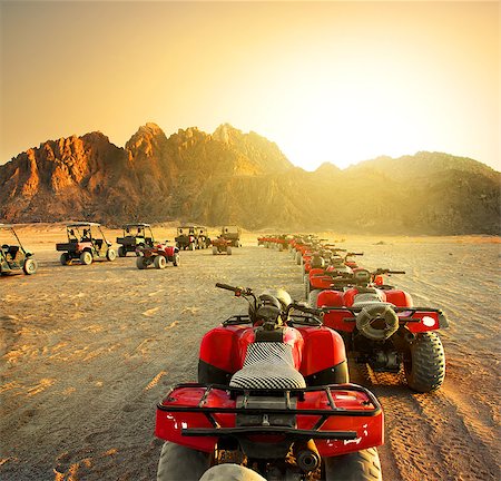 Quad bikes in desert at the sunset Fotografie stock - Microstock e Abbonamento, Codice: 400-08166080