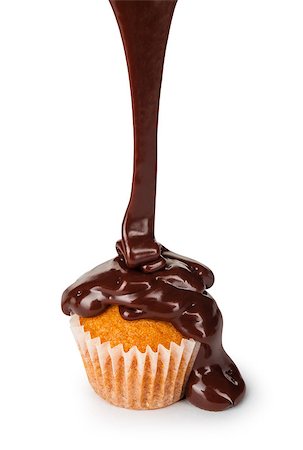 food photography chocolate pouring - pours hot chocolate cupcakes on a white background Stock Photo - Budget Royalty-Free & Subscription, Code: 400-08166138