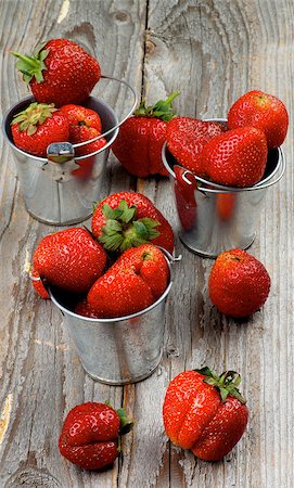 simsearch:400-08020671,k - Fresh Ripe Strawberries in Three Tin Buckets closeup on Rustic Wooden background Stock Photo - Budget Royalty-Free & Subscription, Code: 400-08160583