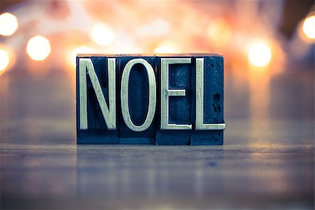 simsearch:400-08161062,k - The word NOEL written in vintage metal letterpress type on a soft backlit background. Stock Photo - Budget Royalty-Free & Subscription, Code: 400-08161032