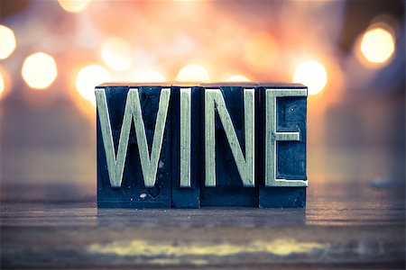 simsearch:400-08161047,k - The word WINE written in vintage metal letterpress type on a soft backlit background. Stock Photo - Budget Royalty-Free & Subscription, Code: 400-08161057