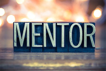 The word MENTOR written in vintage metal letterpress type on a soft backlit background. Stock Photo - Budget Royalty-Free & Subscription, Code: 400-08161079