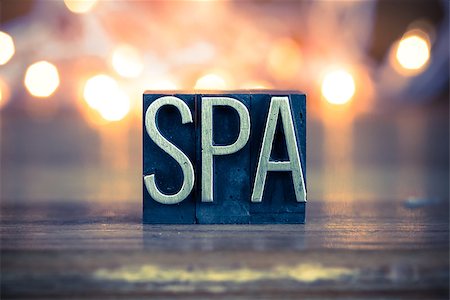 simsearch:400-08161062,k - The word SPA written in vintage metal letterpress type on a soft backlit background. Stock Photo - Budget Royalty-Free & Subscription, Code: 400-08161070