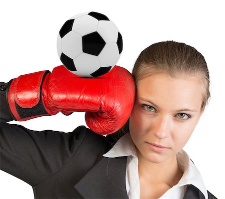 simsearch:400-08161703,k - Businesswoman in boxing gloves with soccer ball looking at camera on isolated white background Photographie de stock - Aubaine LD & Abonnement, Code: 400-08161697