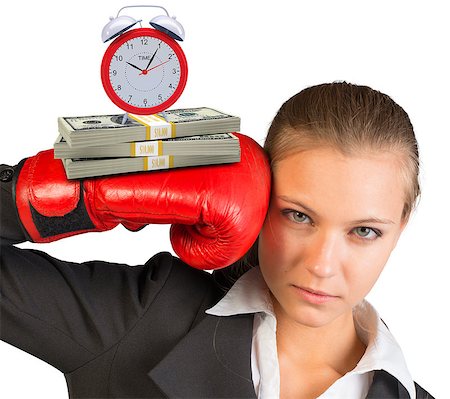 Businesswoman in red boxing gloves looking at camera on isolated white background Stock Photo - Budget Royalty-Free & Subscription, Code: 400-08162922