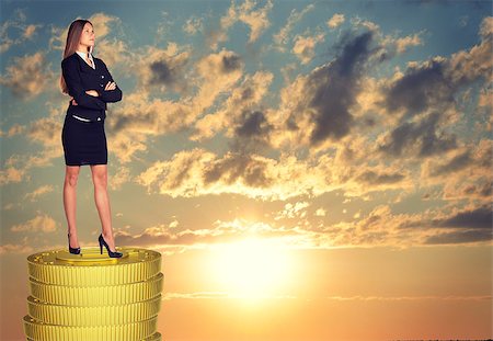 simsearch:400-08158930,k - Businesswoman standing on coins stack and looking up Stock Photo - Budget Royalty-Free & Subscription, Code: 400-08163477