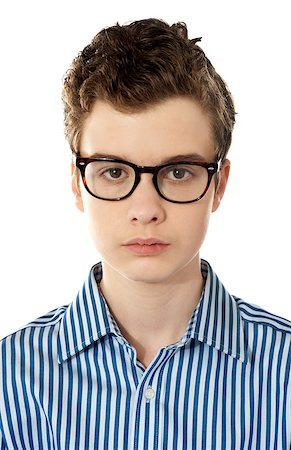 Closeup of a boy wearing glasses isolated over white Stock Photo - Budget Royalty-Free & Subscription, Code: 400-08185044