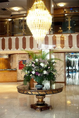 Master centerpiece at hotels lobby. Decorated flowers, chandler above Stock Photo - Budget Royalty-Free & Subscription, Code: 400-08185212