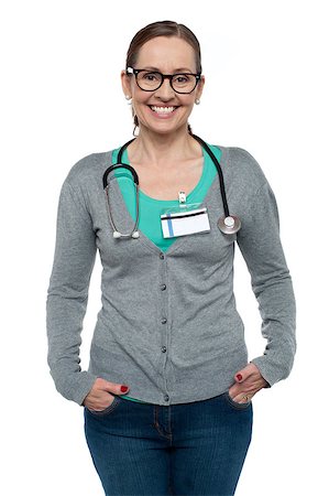 simsearch:400-05745246,k - Gorgeous physician posing casually with stethoscope around her neck. Photographie de stock - Aubaine LD & Abonnement, Code: 400-08185396