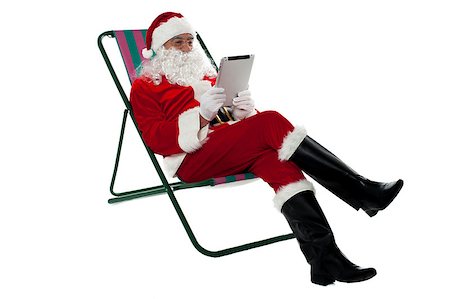 portable chair not people - Kris Kringle relaxing on chair and using electronic tablet. Isolated on white. Stock Photo - Budget Royalty-Free & Subscription, Code: 400-08185605