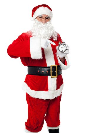 simsearch:400-08491713,k - Santa pointing at an antique time piece illustrating time as 10-10 Stock Photo - Budget Royalty-Free & Subscription, Code: 400-08185611