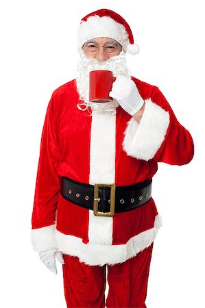 pic of drinking celebration for new year - Aged smiling Santa enjoying his coffee isolated over white background. Stock Photo - Budget Royalty-Free & Subscription, Code: 400-08185627