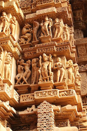 Famous erotic human sculptures at temple in Khajuraho, India Foto de stock - Super Valor sin royalties y Suscripción, Código: 400-08186054